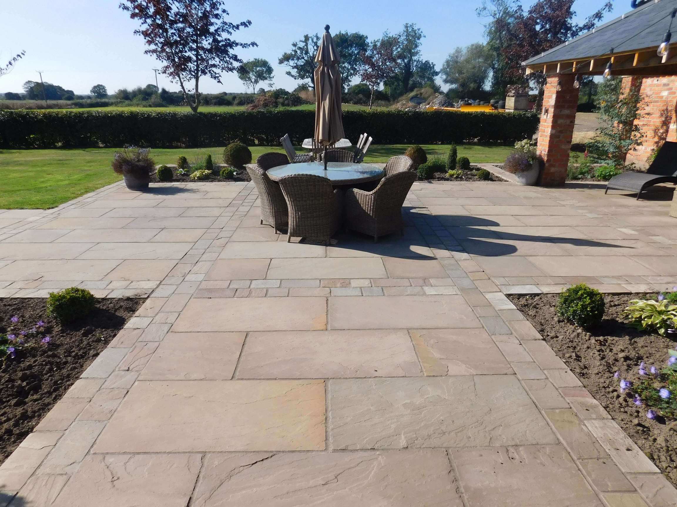 Flagstone driveway back garden
