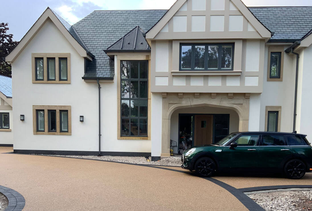 Resin driveway front of house